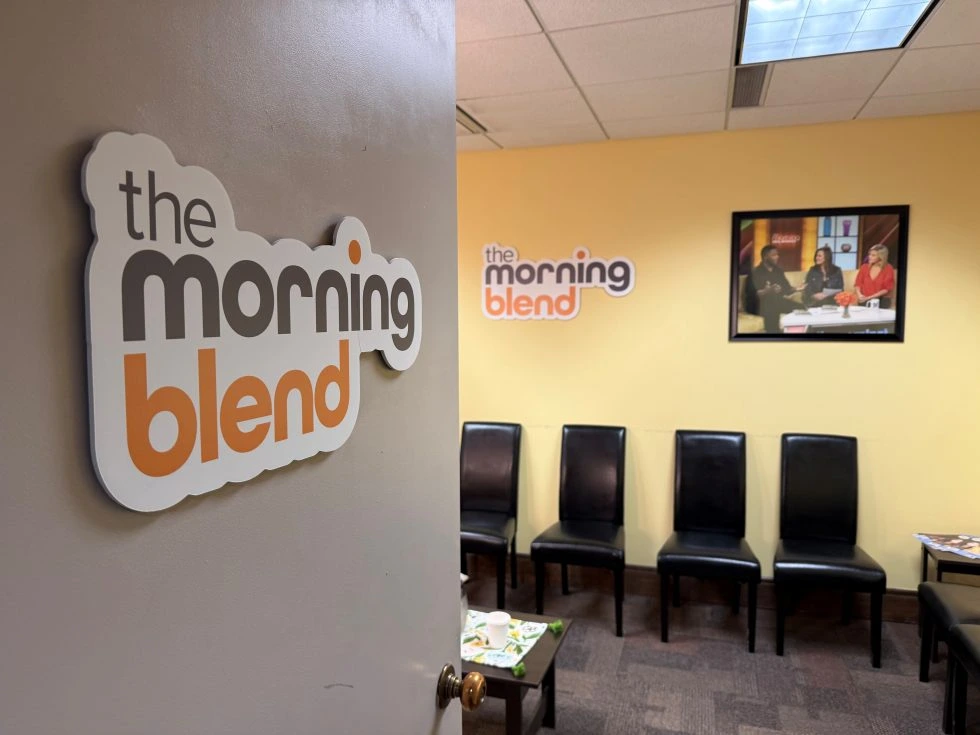 Morning Blend logo displayed on the wall of a waiting room, creating a welcoming atmosphere for visitors