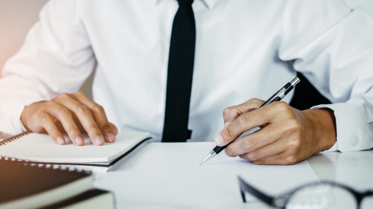 Man is reviewing documents