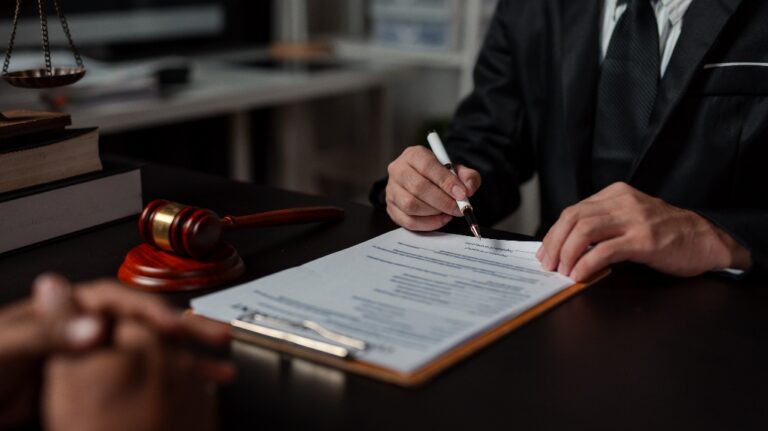 Lawyer and client are reviewing documents
